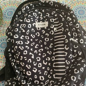 Dakine black and white cheeta/leopard backpack